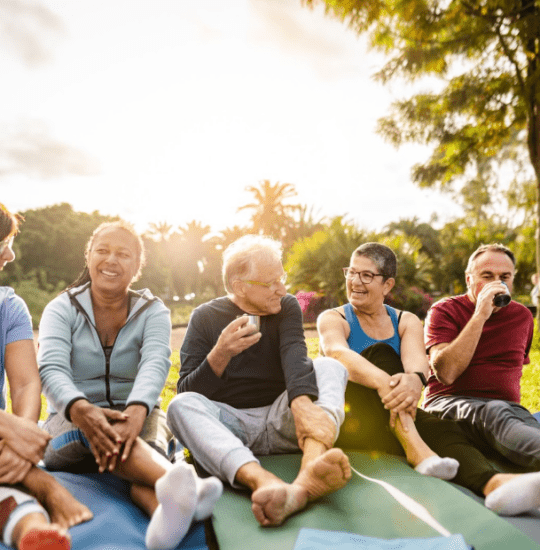 a group of seniors enjoy time together relaxing after physical activity near Upper St. Clair, PA